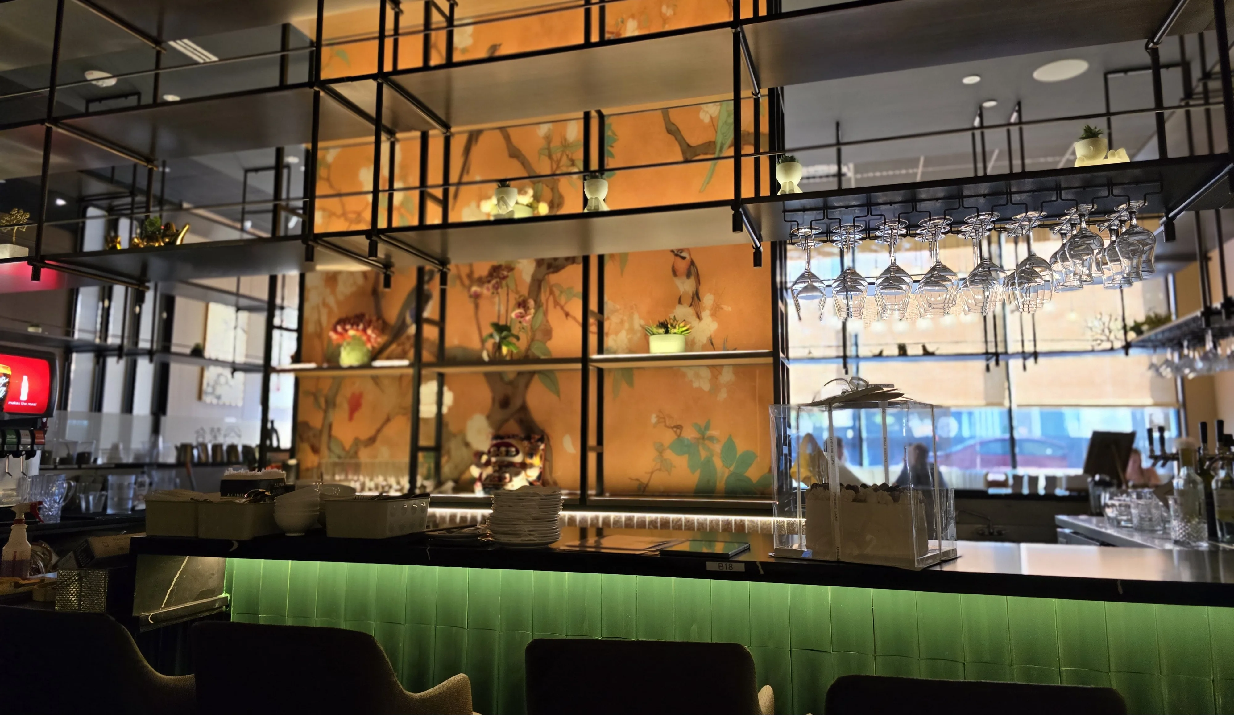 Emerald-green bar interior at RH Bistro in Falls Church